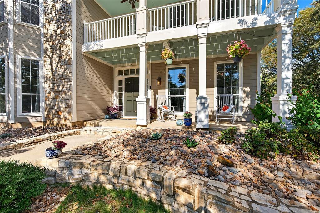 10312 Arvin Hill Road Aubrey, TX 76227 - Photo 4 of 40 front view of a house with a patio