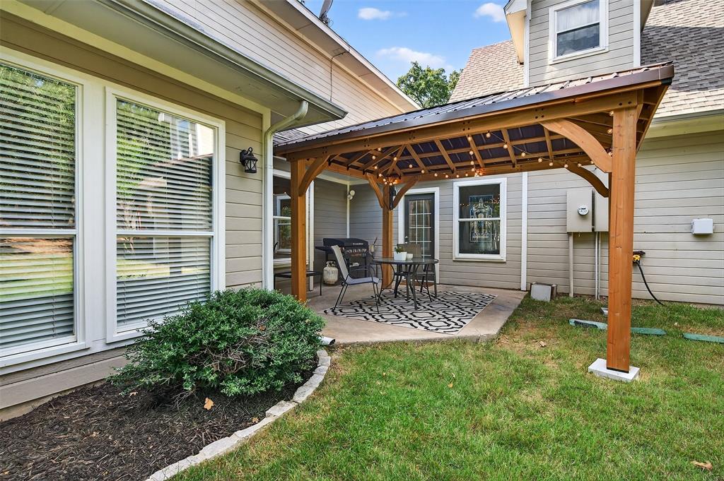 10312 Arvin Hill Road Aubrey, TX 76227 - Photo 7 of 40 a view of house with patio