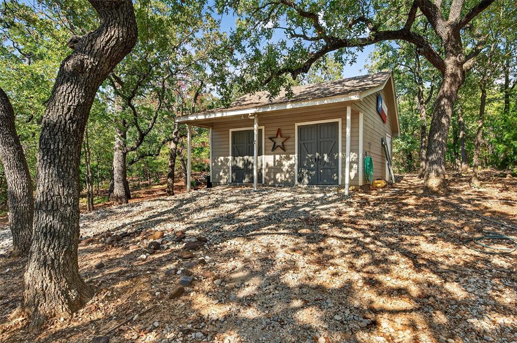 10312 Arvin Hill Road Aubrey, TX 76227 - Photo 10 of 40 a front view of a house with a yard