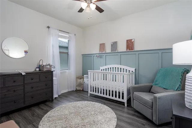 a view of a livingroom with furniture and wooden floor