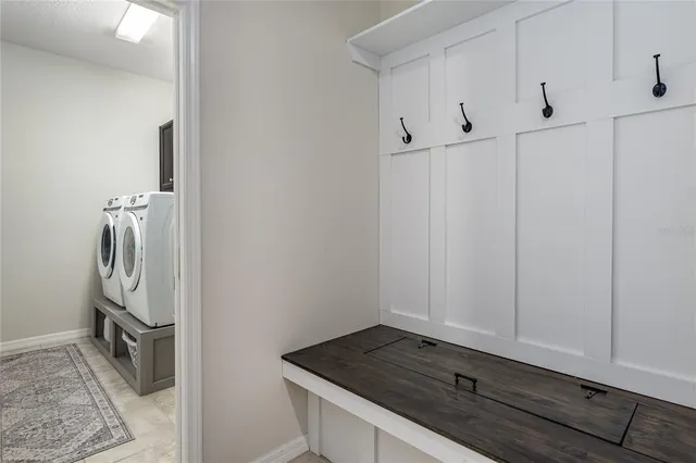 a view of entryway with wooden floor