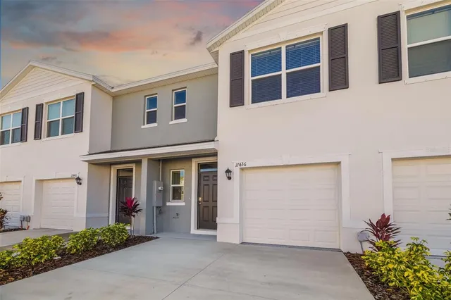 a view of a bathroom from a hallway