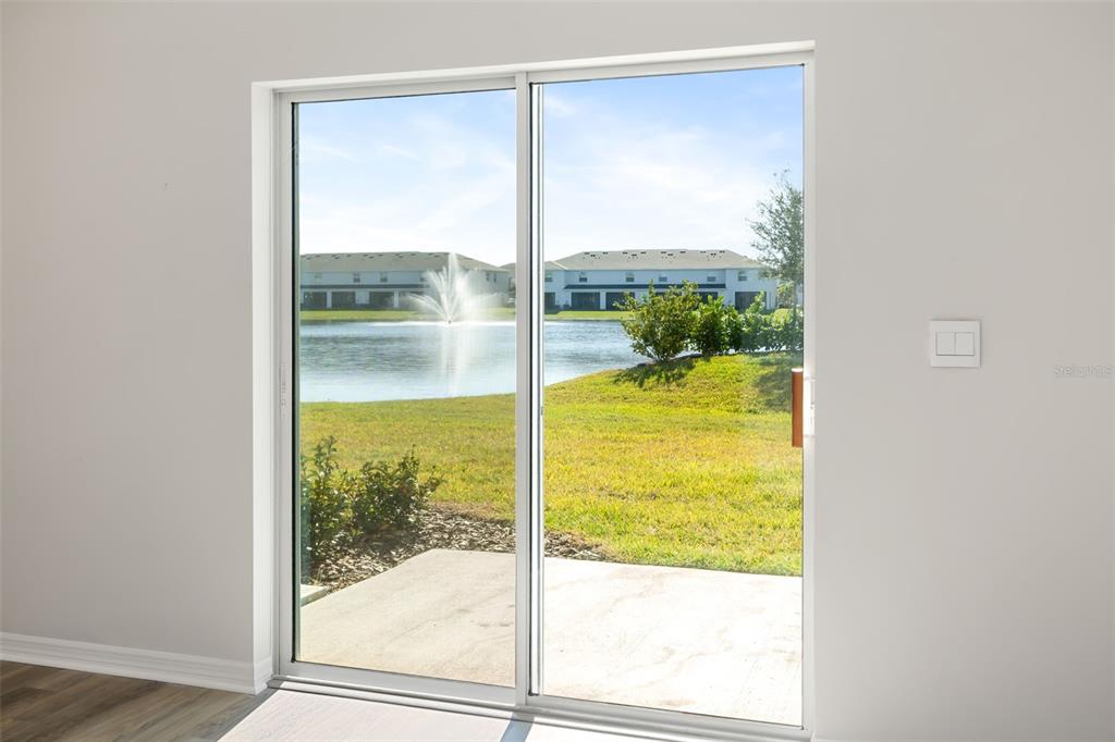 17436 Haysack Terrace Bradenton, FL 34211 - Photo 13 of 53 a view of a glass door with a from a window
