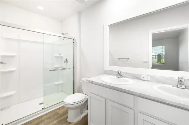 a view of a swimming pool with a lounge chairs