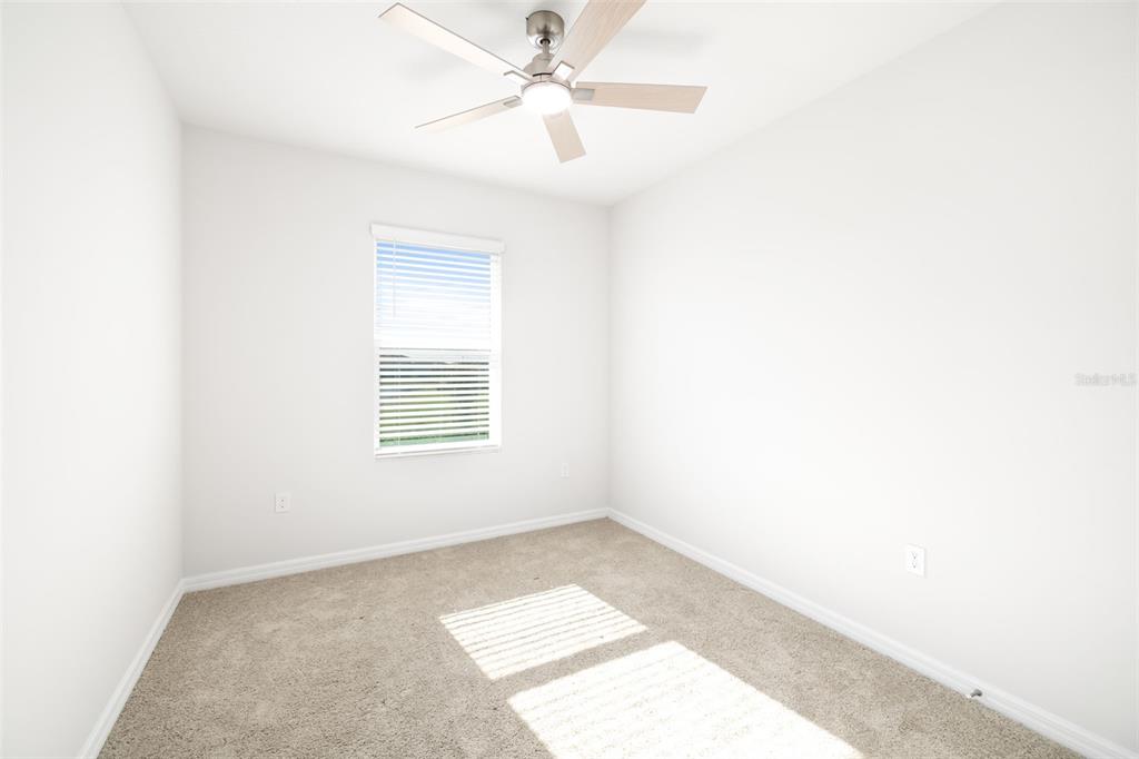 17436 Haysack Terrace Bradenton, FL 34211 - Photo 23 of 53 a view of an empty room with a window