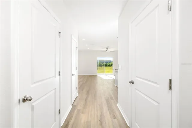 a kitchen with stainless steel appliances a stove a microwave and sink