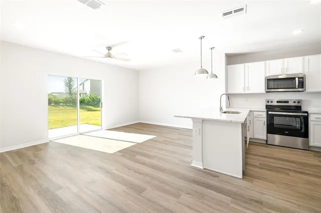 a bathroom with a sink a mirror and a toilet