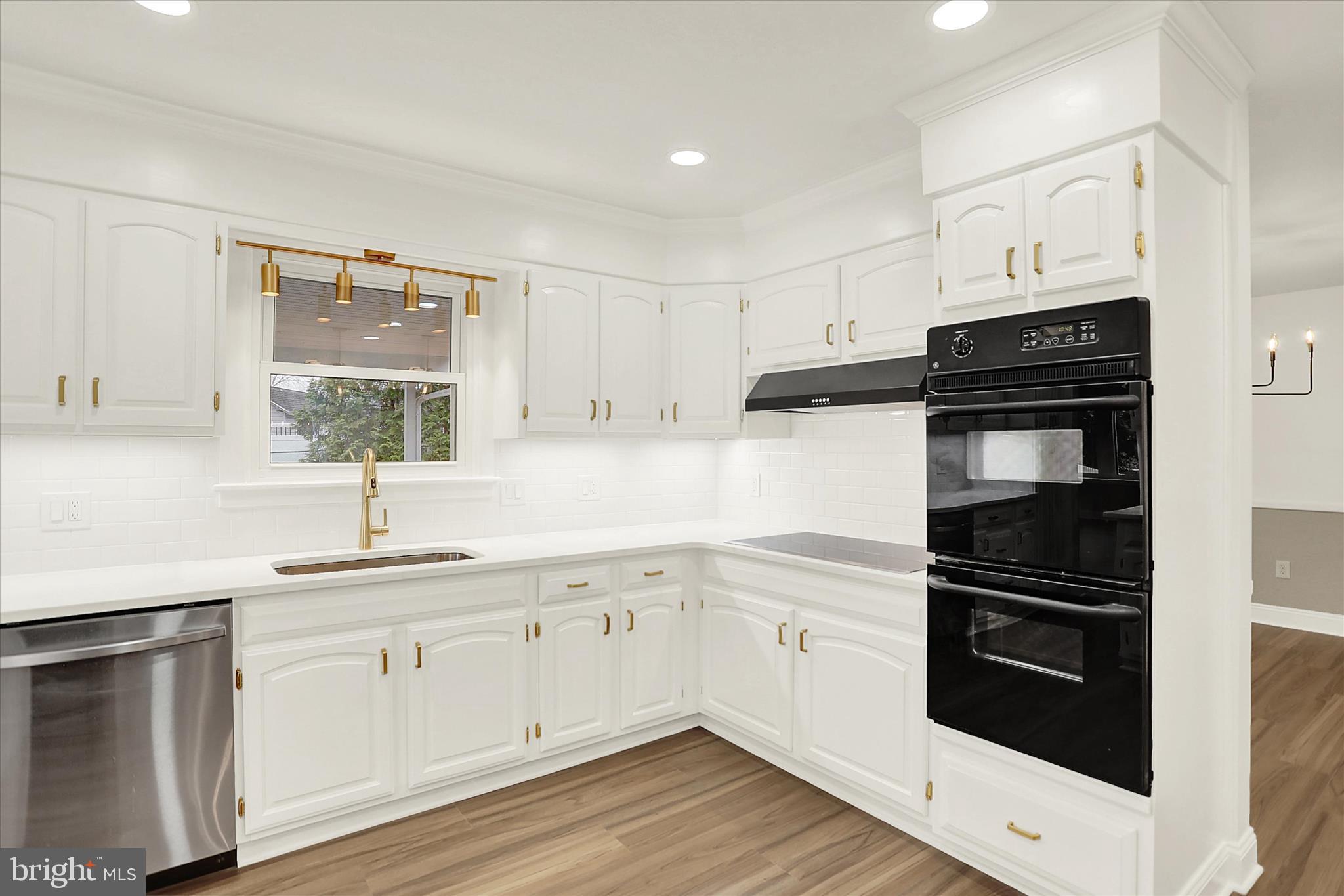 1612 Elbridge Road Harrisburg, PA 17112 - Photo 11 of 39 a kitchen with a refrigerator stove and sink