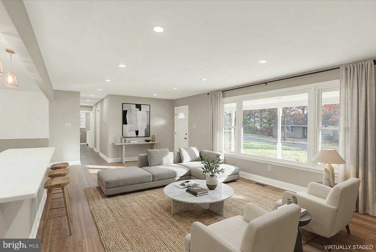 1612 Elbridge Road Harrisburg, PA 17112 - Photo 15 of 39 a living room with furniture and a large window