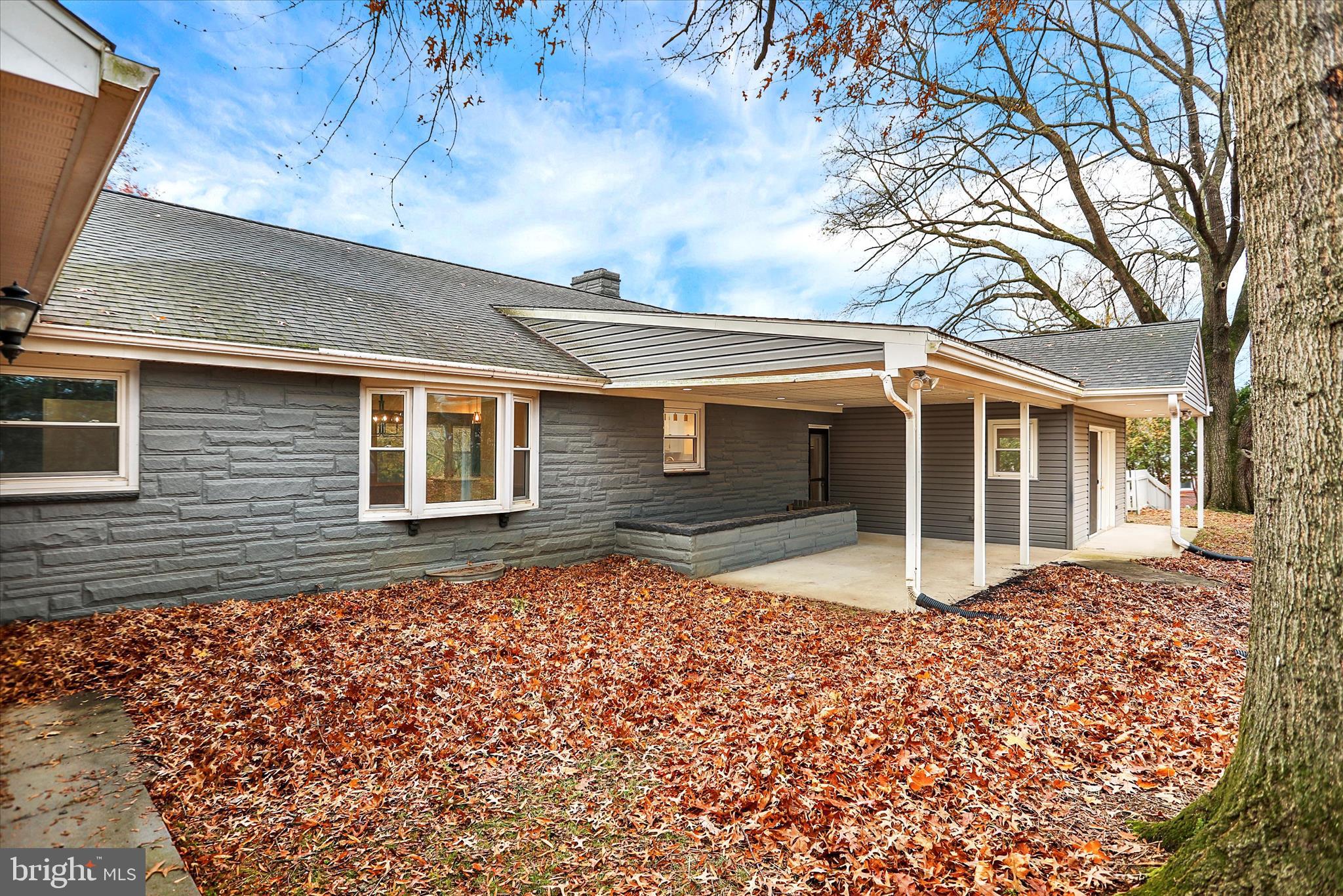 1612 Elbridge Road Harrisburg, PA 17112 - Photo 30 of 39 a front view of a house with a garden