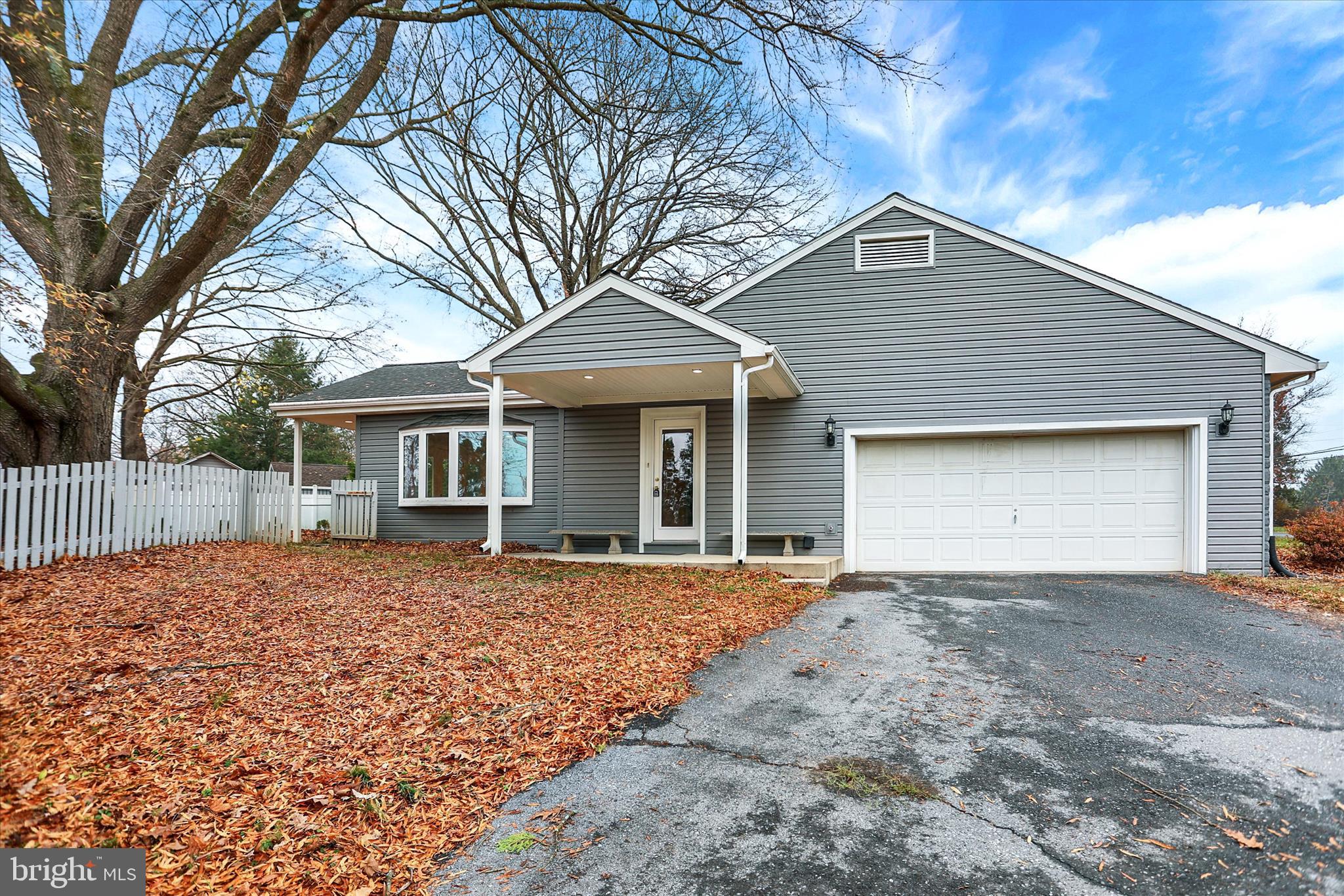 1612 Elbridge Road Harrisburg, PA 17112 - Photo 3 of 39 a front view of a house with a yard