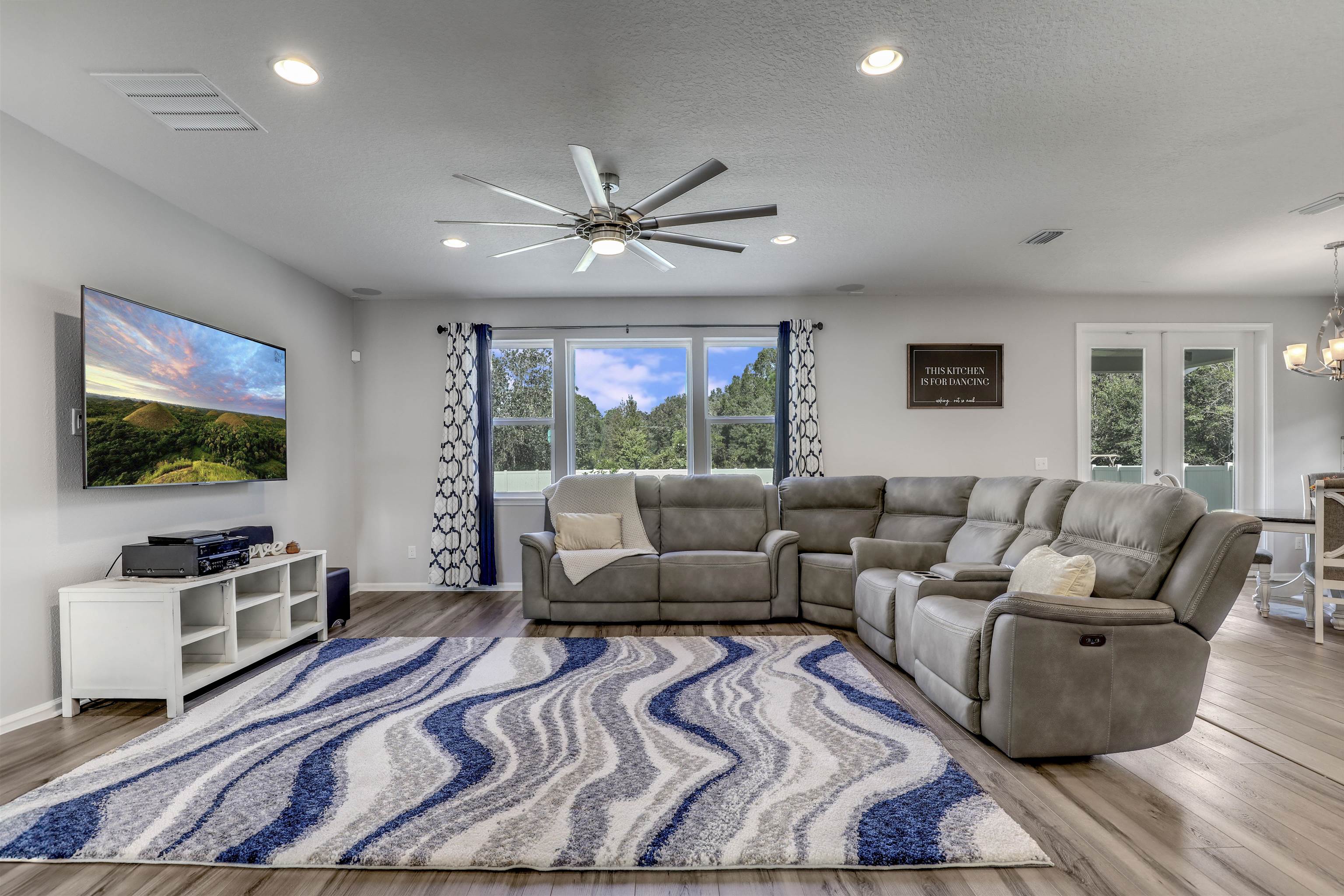 93 Firefly Trace St. Augustine, FL 32092 - Photo 22 of 76 a living room with furniture and a flat screen tv
