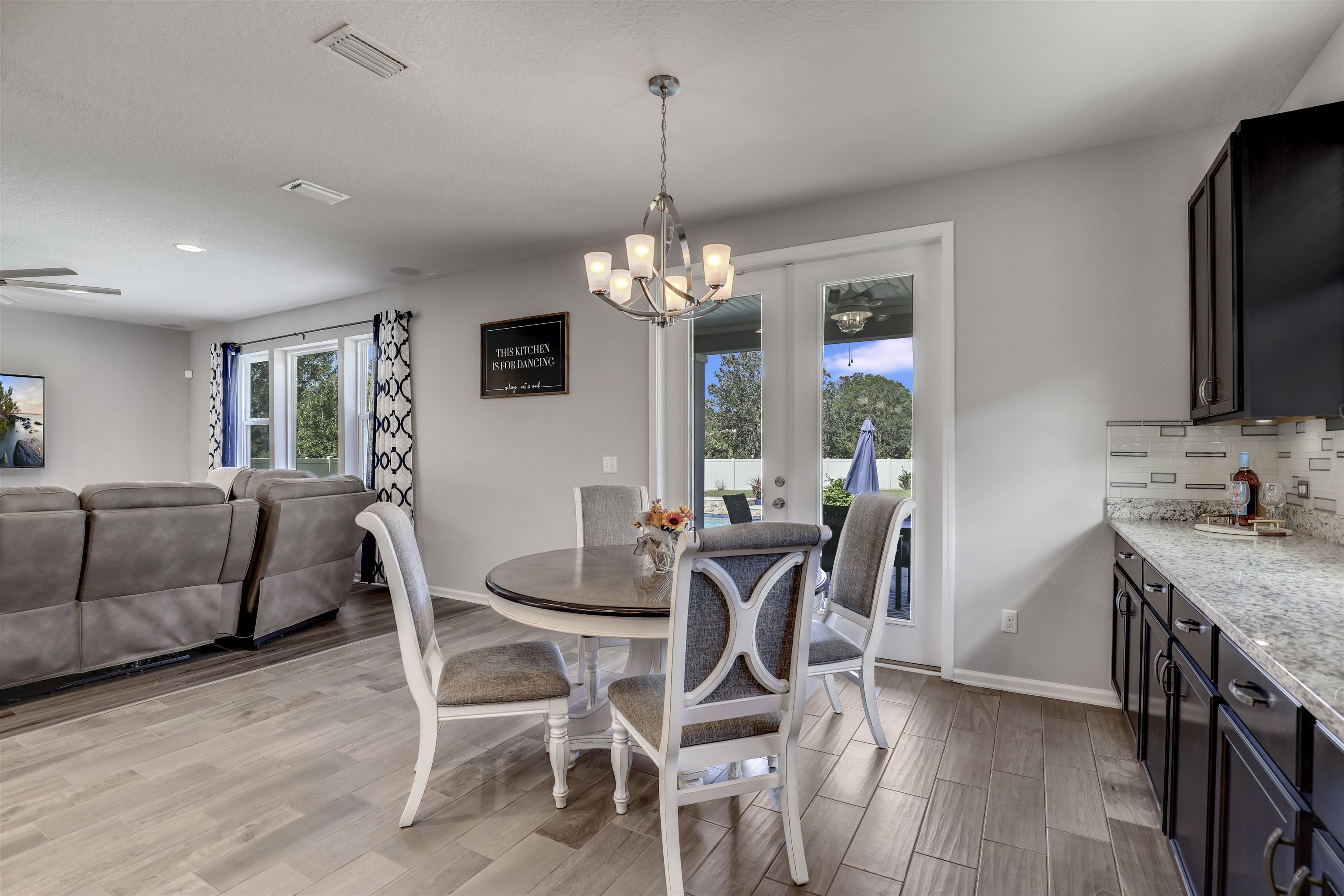93 Firefly Trace St. Augustine, FL 32092 - Photo 28 of 76 a view of a dining room with furniture and window