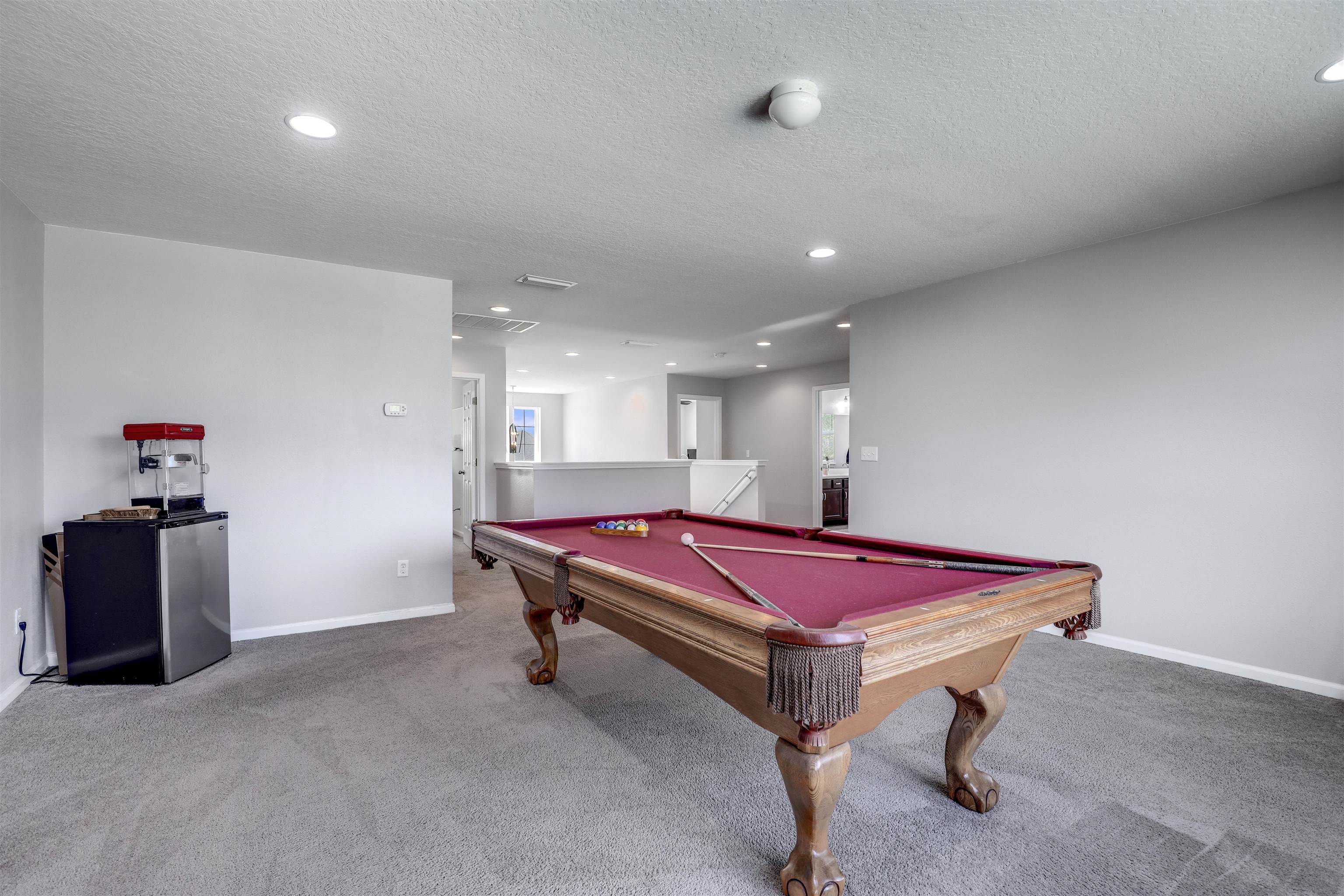 93 Firefly Trace St. Augustine, FL 32092 - Photo 37 of 76 a room with pool table and a couch