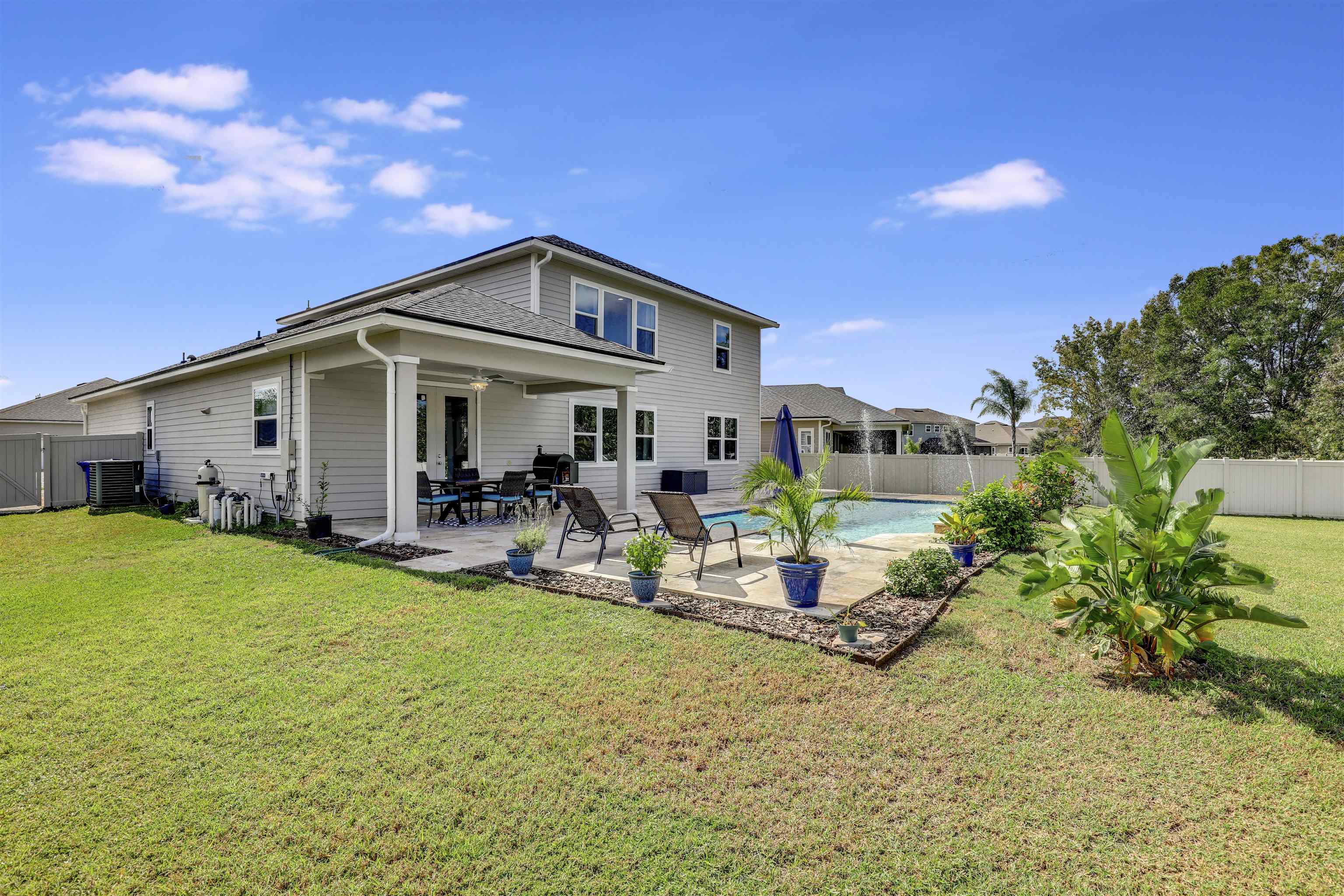 93 Firefly Trace St. Augustine, FL 32092 - Photo 57 of 76 a view of a house with backyard and sitting area
