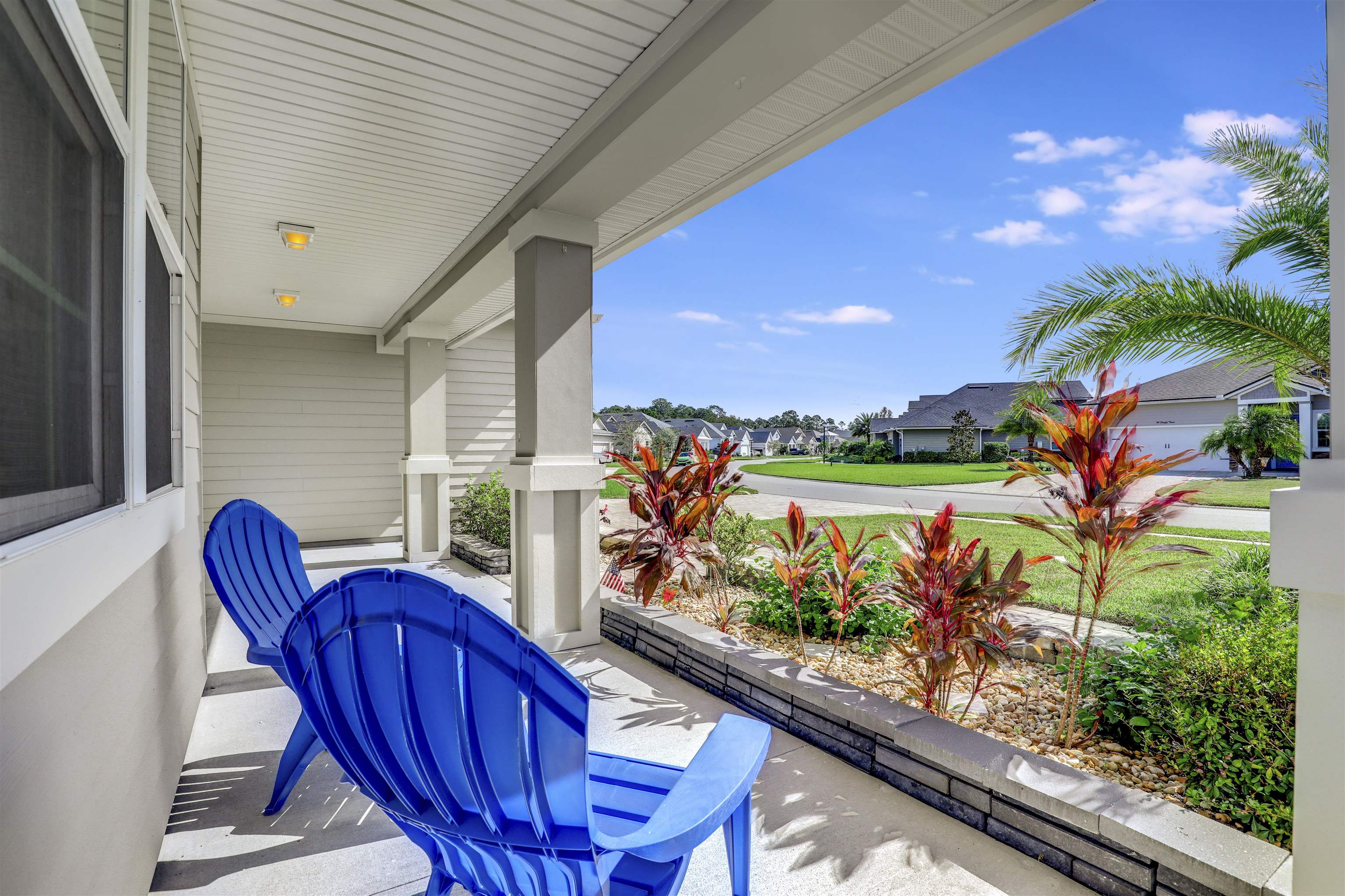 93 Firefly Trace St. Augustine, FL 32092 - Photo 10 of 76 a view of a chairs and table in patio