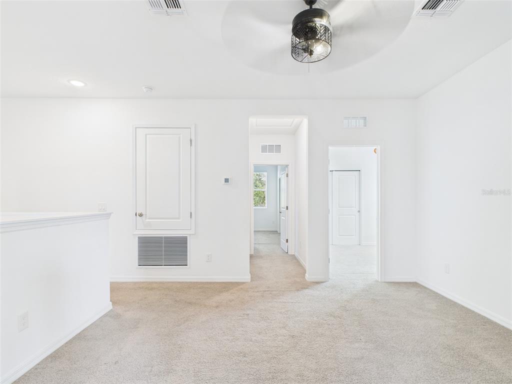 2033 Emerald Springs Drive Apopka, FL 32712 - Photo 17 of 49 a view of empty room