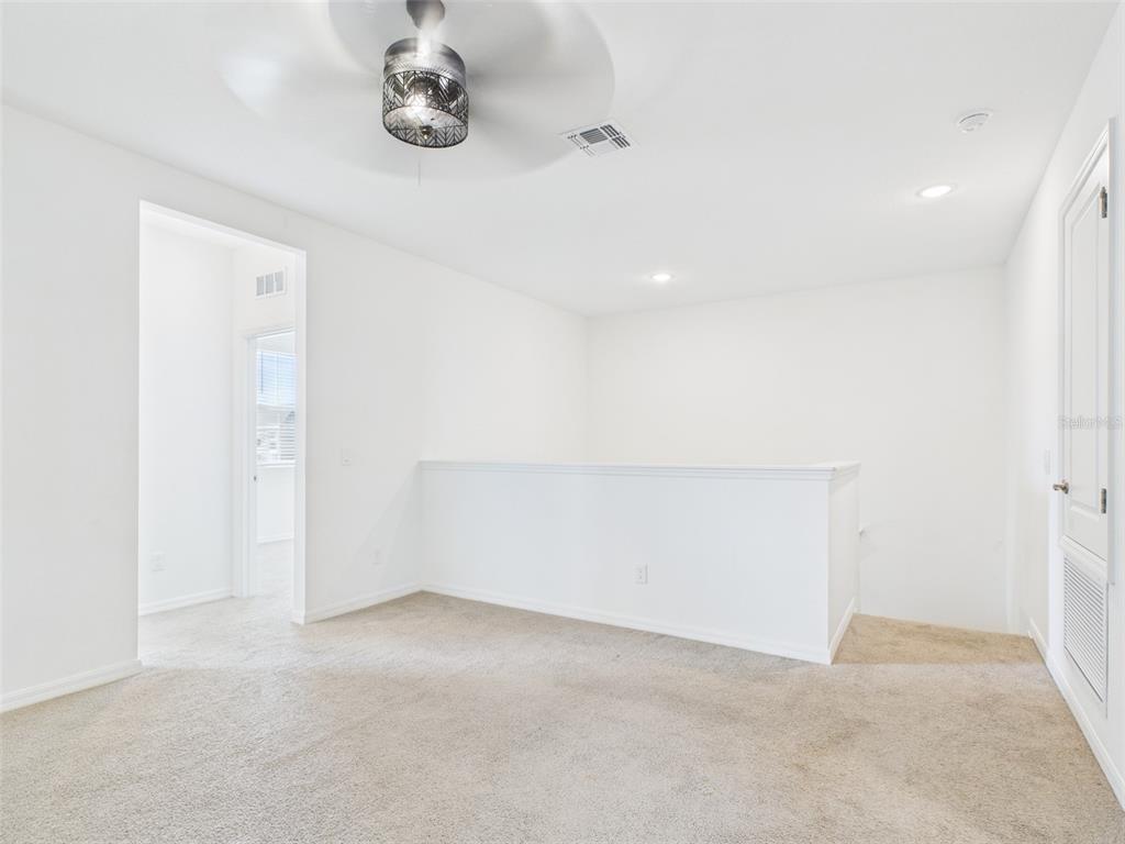 2033 Emerald Springs Drive Apopka, FL 32712 - Photo 18 of 49 a view of room with ceiling fan