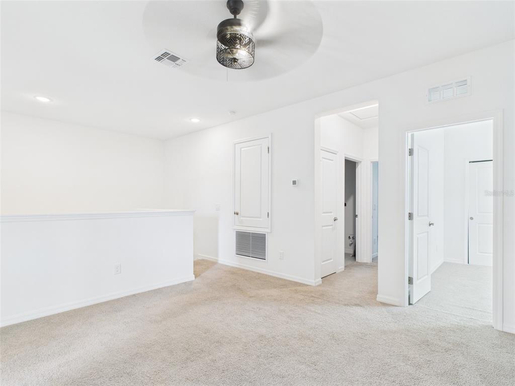 2033 Emerald Springs Drive Apopka, FL 32712 - Photo 25 of 49 a view of an empty room