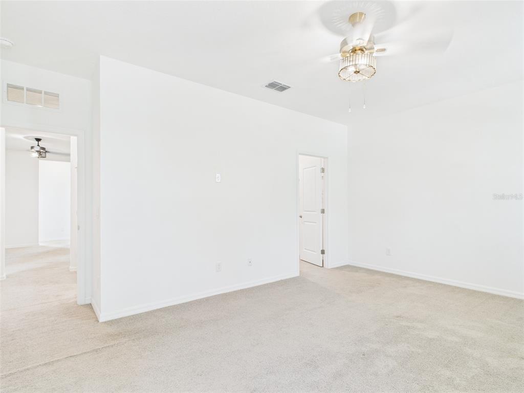2033 Emerald Springs Drive Apopka, FL 32712 - Photo 33 of 49 a view of an empty room
