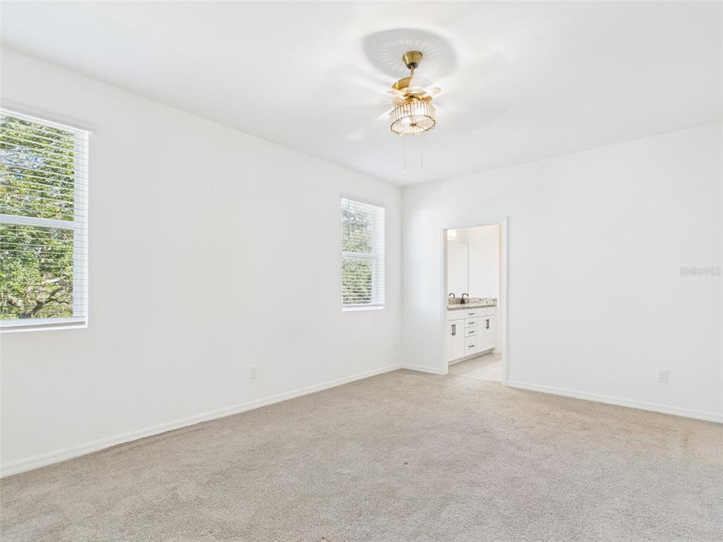 2033 Emerald Springs Drive Apopka, FL 32712 - Photo 34 of 49 an empty room with a window