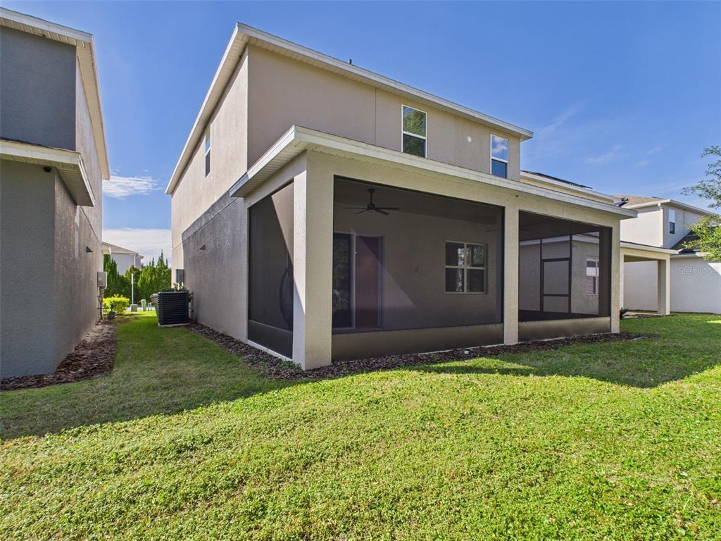 2033 Emerald Springs Drive Apopka, FL 32712 - Photo 41 of 49 a view of a back yard of the house