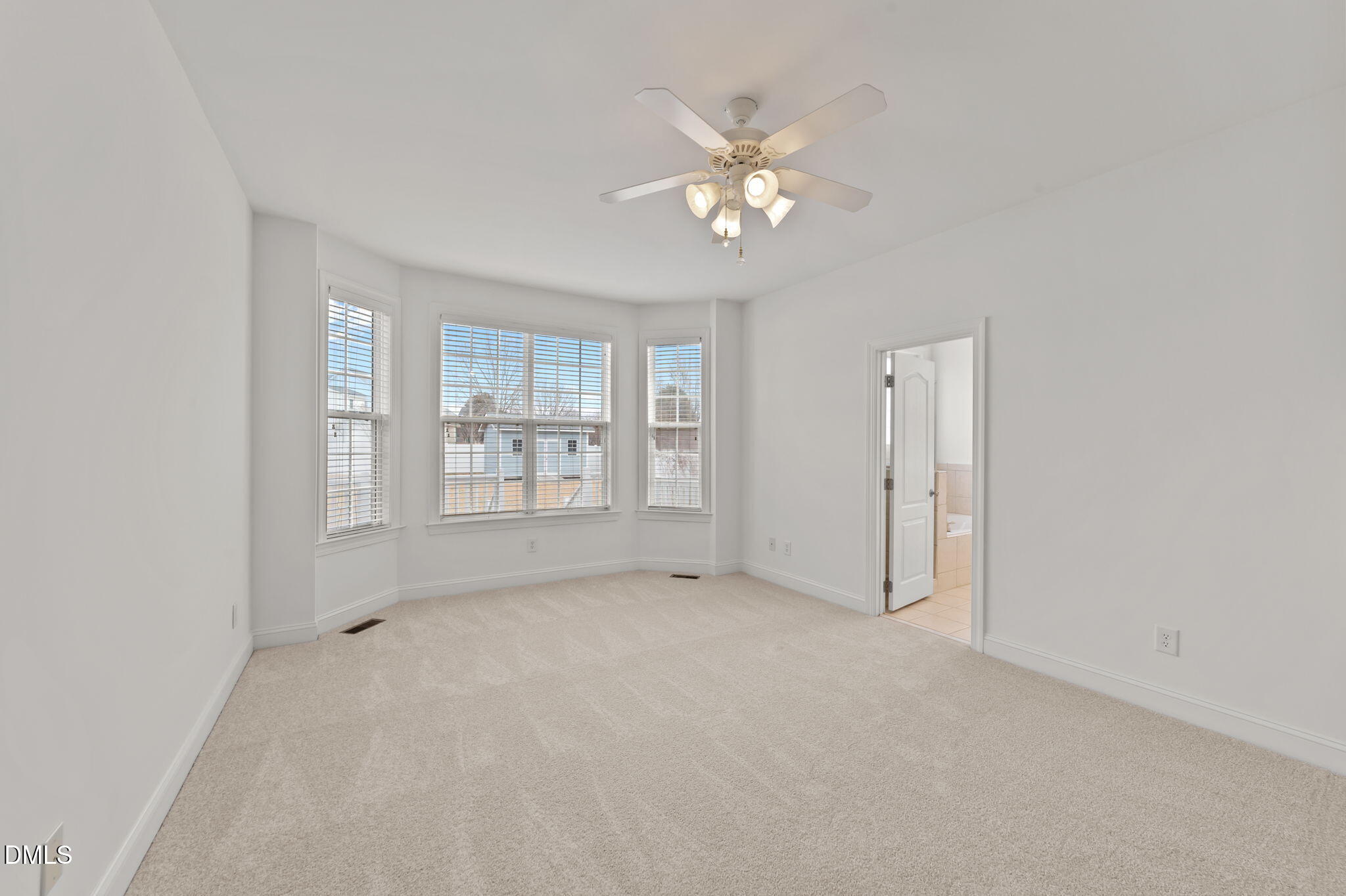 7101 Numa Circle Willow Spring, NC 27592 - Photo 14 of 44 a view of an empty room with a window
