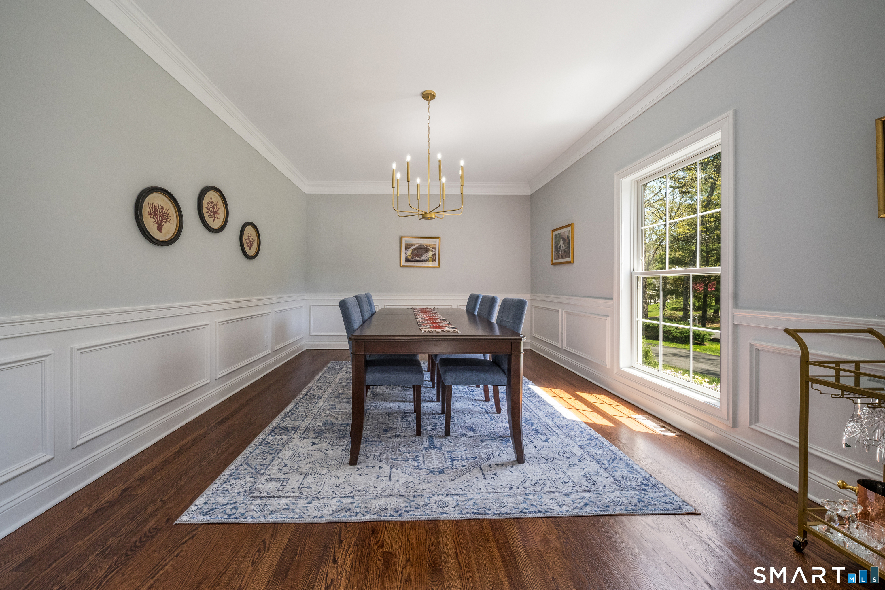 9 Sunset Ridge Drive Guilford, CT 06437 - Photo 13 of 40 a view of a dining room with furniture window and wooden floor