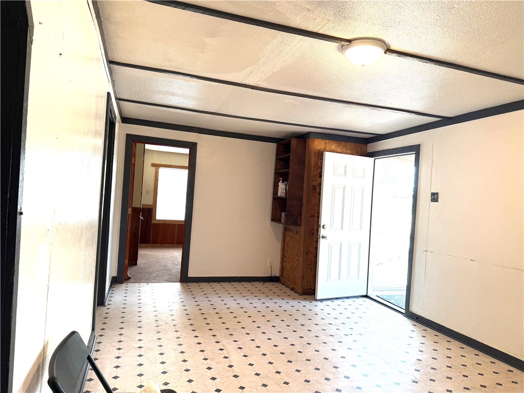 147 County Road 153 Alice, TX 78332 - Photo 11 of 23 a view of a hallway with wooden floor and entryway