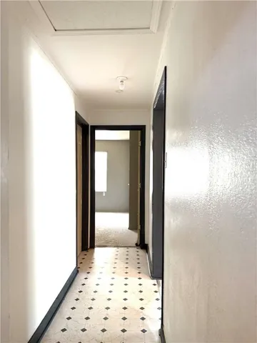 a kitchen with a sink a stove and refrigerator