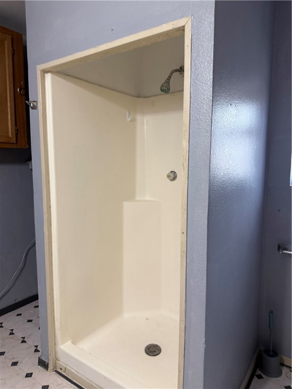 147 County Road 153 Alice, TX 78332 - Photo 20 of 23 a bathroom with a glass shower door