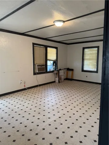 a view of a backyard of the house