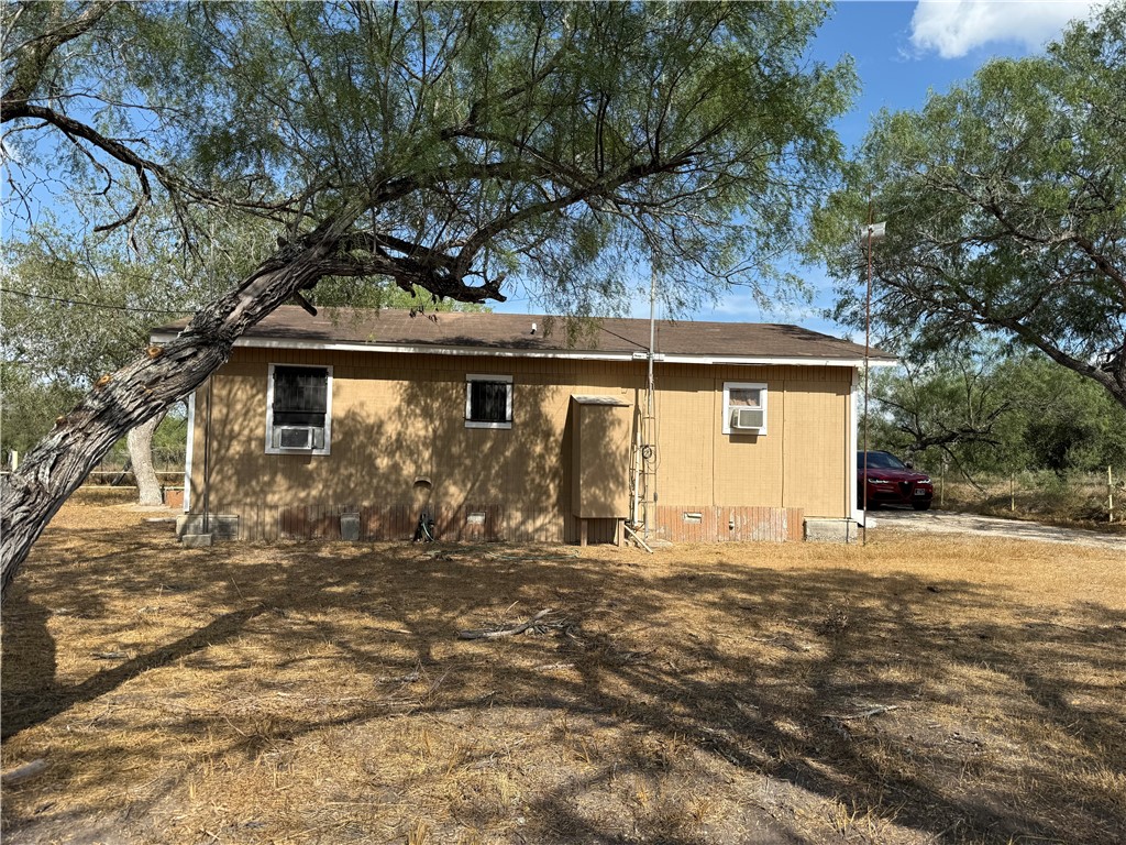 147 County Road 153 Alice, TX 78332 - Photo 23 of 23 a front view of a house with a large tree