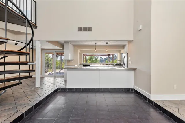a view of a living room with a window