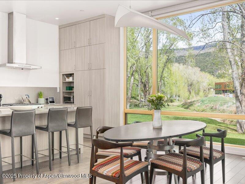 102 Evans Road, Unit 107 Basalt, CO 81621 - Photo 6 of 25 a view of a dining room with furniture window and outside view