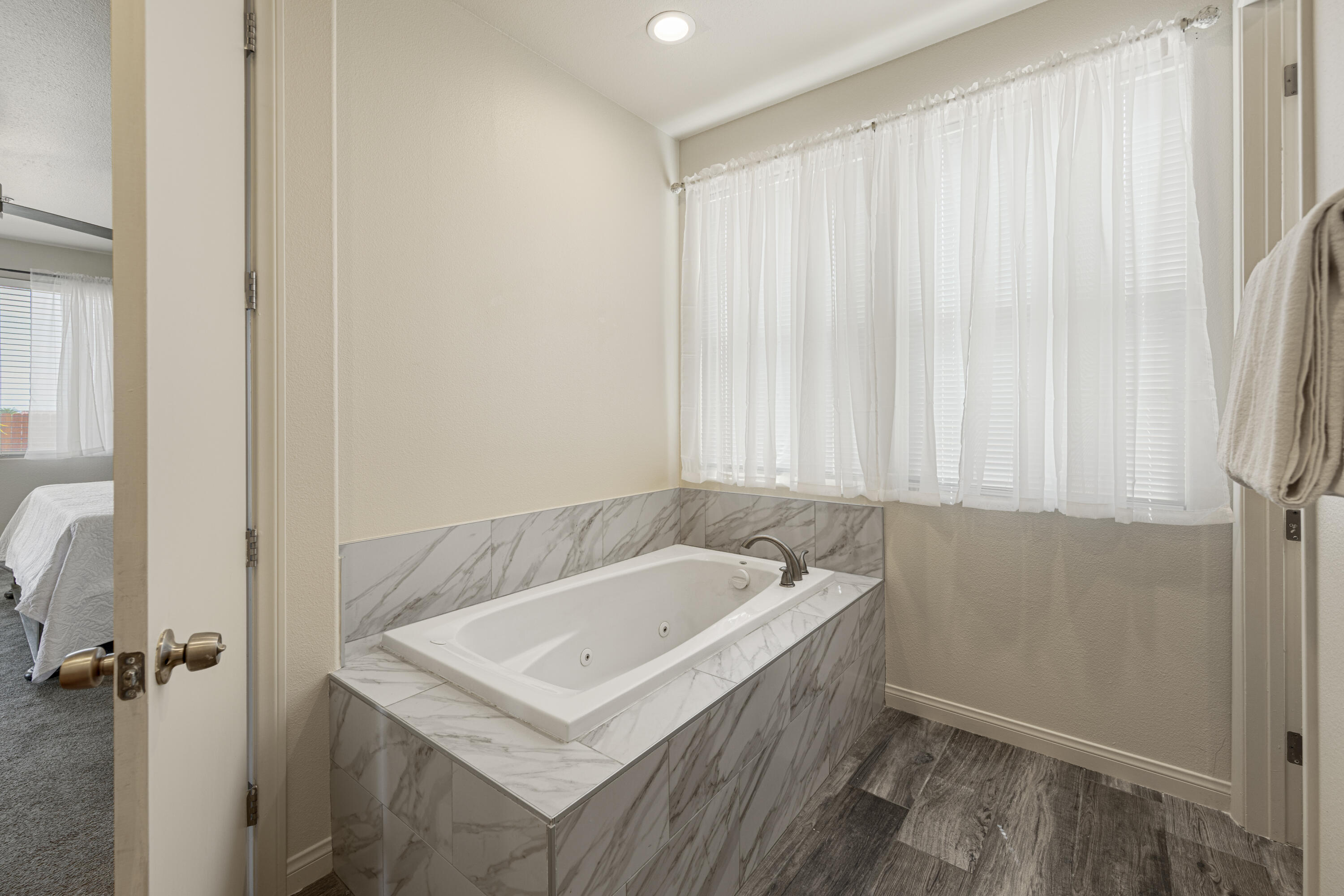 8680 Monument View Drive Yucca Valley, CA 92284 - Photo 25 of 51 a bathroom with a sink and a bathtub