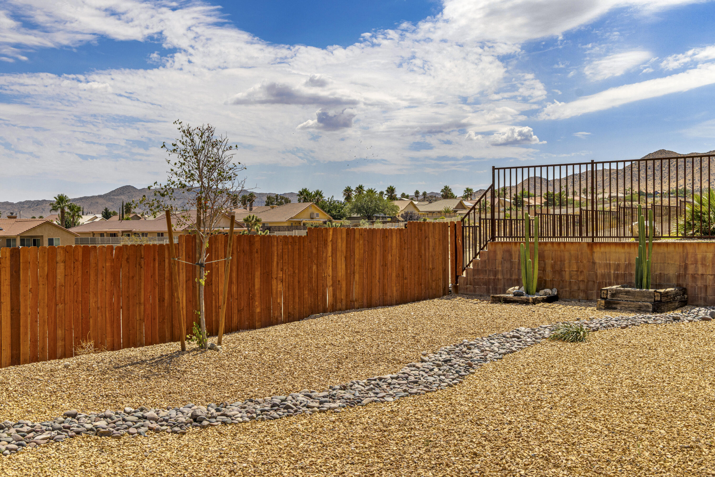 8680 Monument View Drive Yucca Valley, CA 92284 - Photo 33 of 51 a view of a backyard