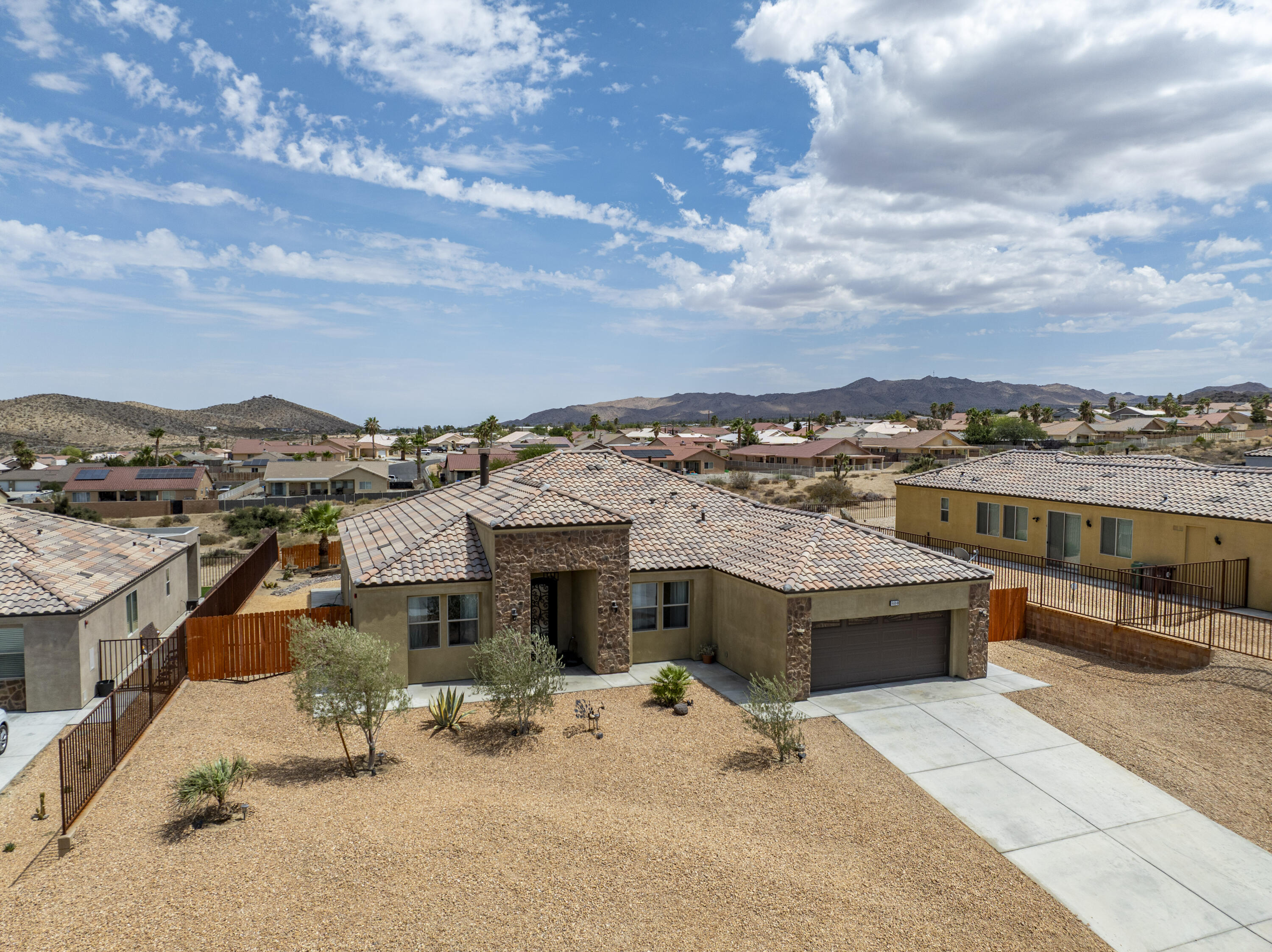 8680 Monument View Drive Yucca Valley, CA 92284 - Photo 36 of 51 a view of a terrace with yard