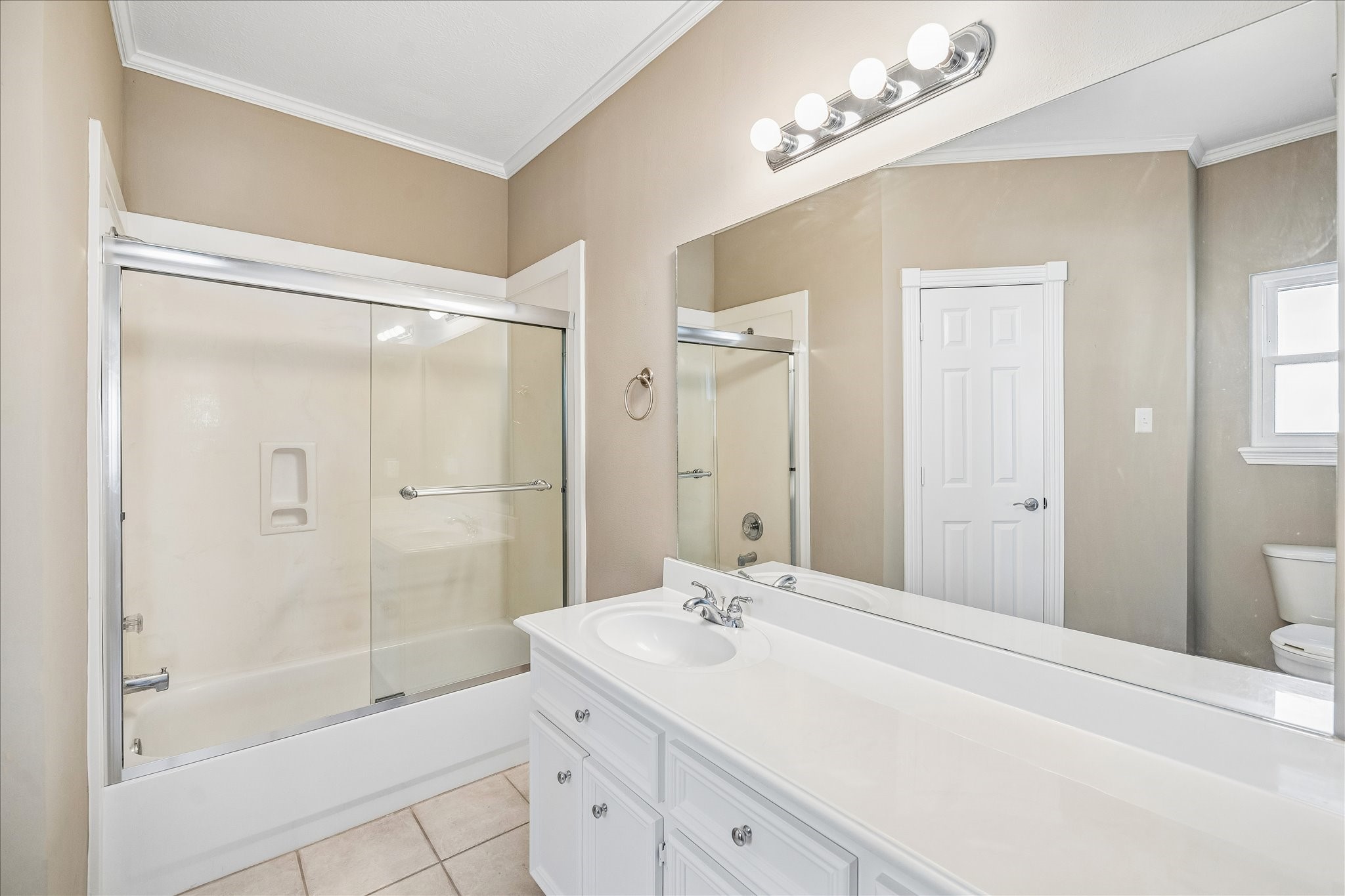 16407 Emilia Court Spring, TX 77379 - Photo 28 of 35 Ensuite bath for secondary bedroom #3 with all the things!