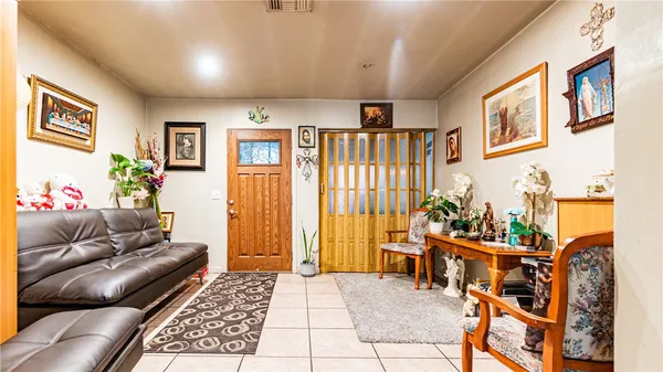 a view of living room with washer and dryer