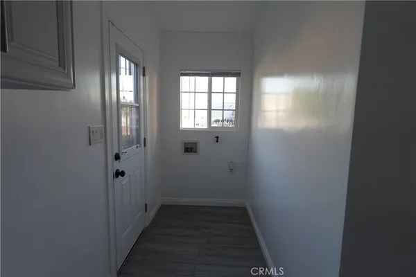 a view of a bathroom from the hallway