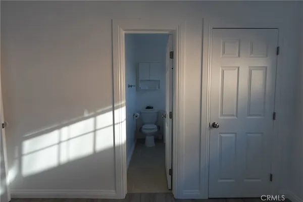 a bathroom with a glass shower door