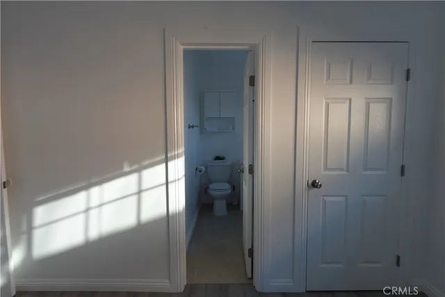 a bathroom with a glass shower door