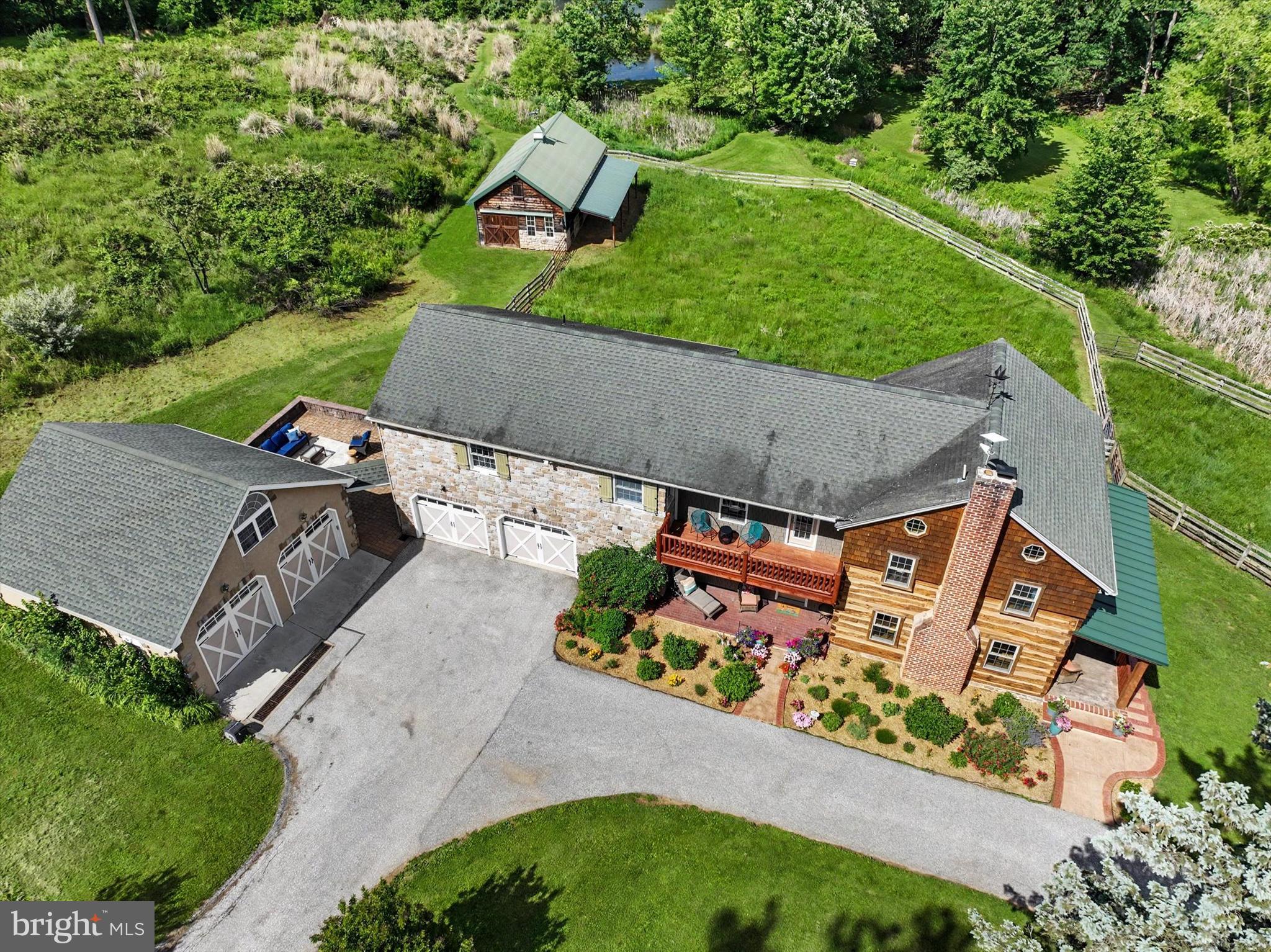 4941 Walters Hatchery Road Spring Grove, PA 17362 - Photo 7 of 71 an aerial view of a house with outdoor space
