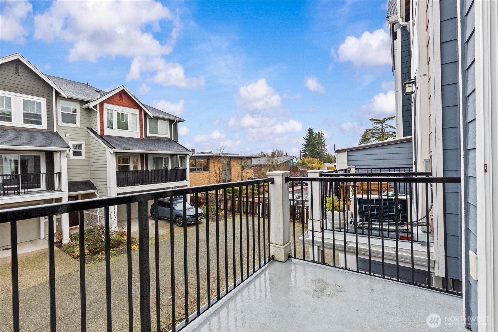 3400 Southwest Graham Street, Unit 703 Seattle, WA 98126 - Photo 28 of 28 a view of city from a balcony