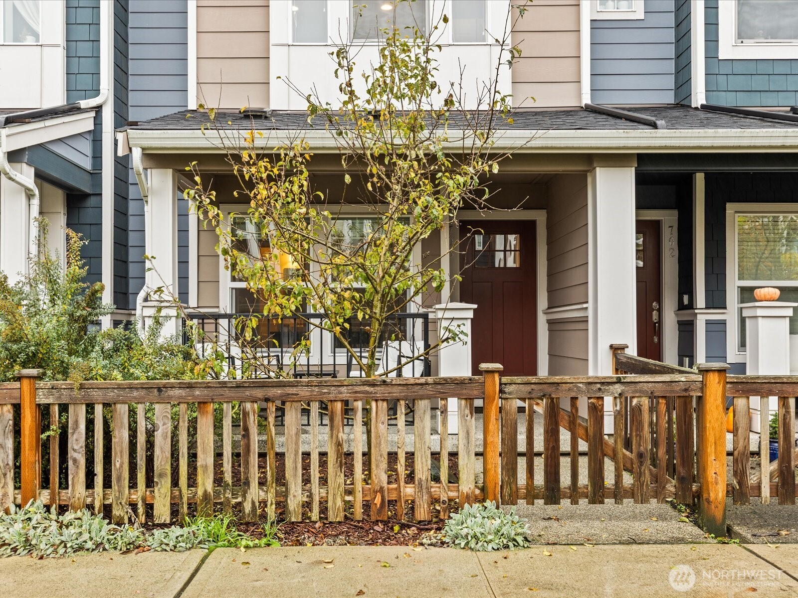 3400 Southwest Graham Street, Unit 703 Seattle, WA 98126 - Photo 3 of 28 front view of a building with a street