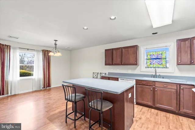 a view of a kitchen area with furniture and window