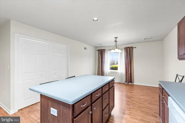 a kitchen that has a cabinets in it
