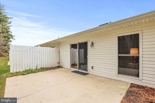 a view of backyard with garage