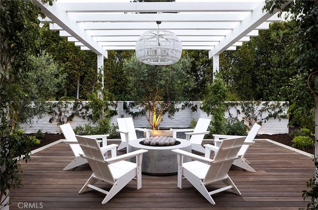 a view of a chairs and table in the patio